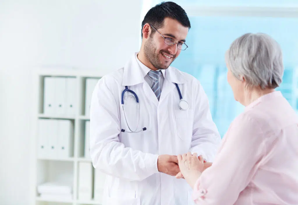 young doctor supporting his patient