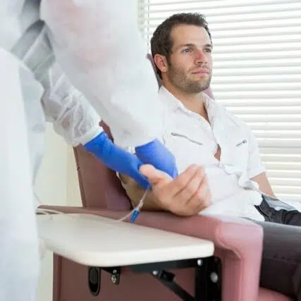 Young male patient receiving ketamine treatment