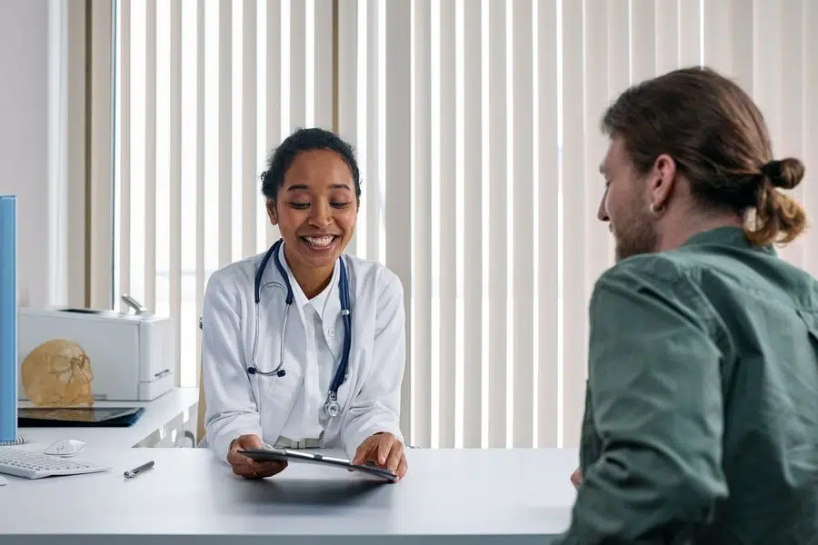 Patient having a consultation with a Physician for ketamine assisted psychotherapy.