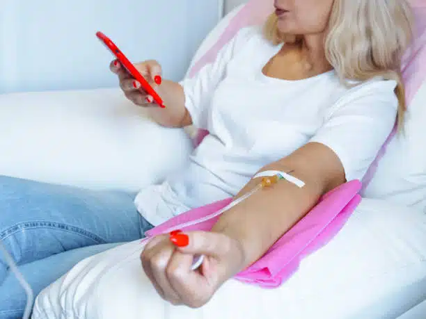 Woman getting a vitamin c iv therapy in the clinic.