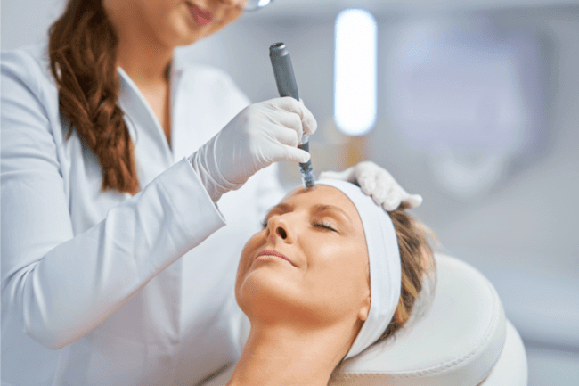 Woman under going Skin Revitalization procedure in the clinic.