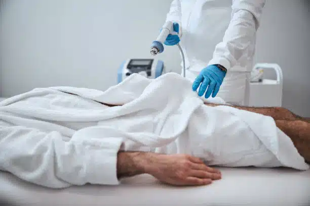 Man under going ultrasonic shockwave therapy to treat his Erectile Dysfunction.
