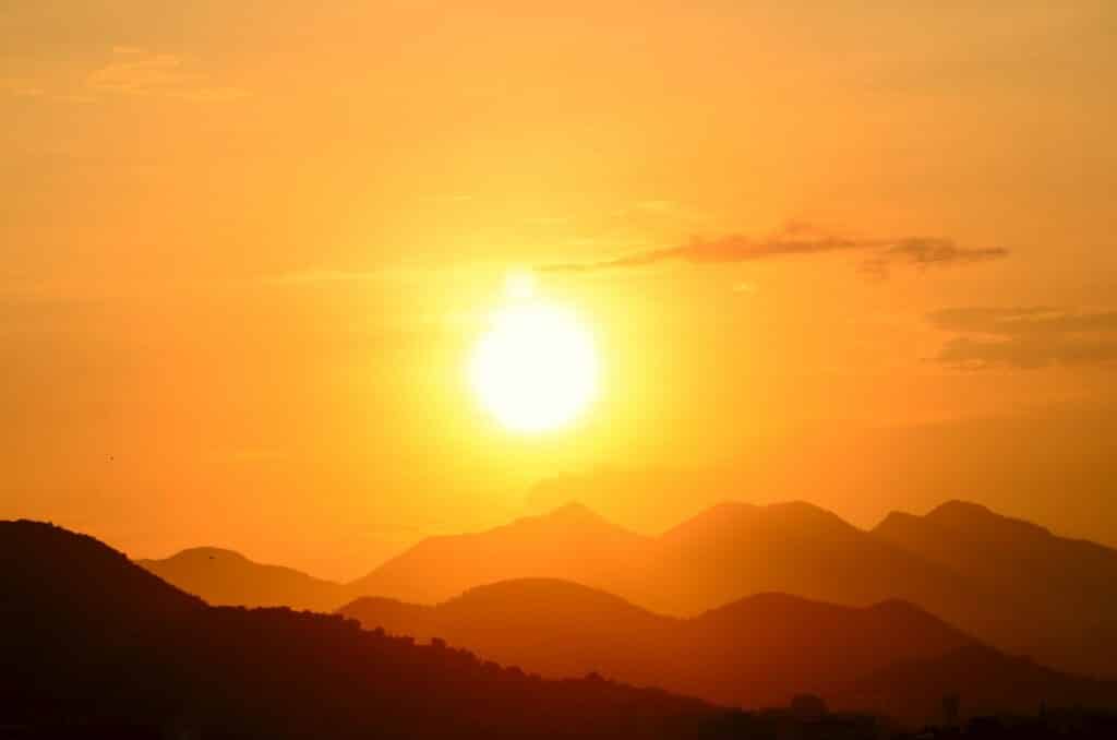 Picture of the sun over mountains for sun spots 