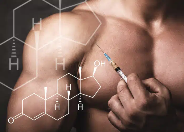 Testosterone Therapy concept, man holding a syringe.